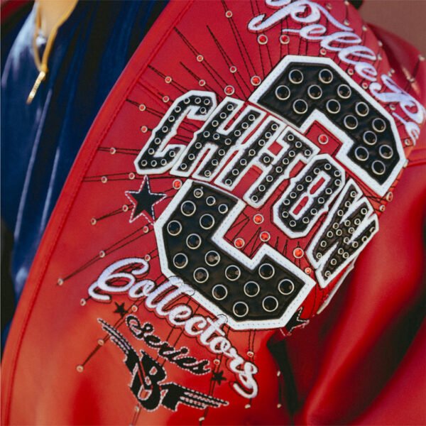 Close-up of red Pelle Pelle ChiTown Collector jacket chest embroidery with studded C logo – Chi Town Pelle Pelle
